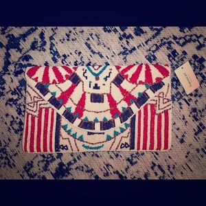 NEW beaded clutch never been used with tags